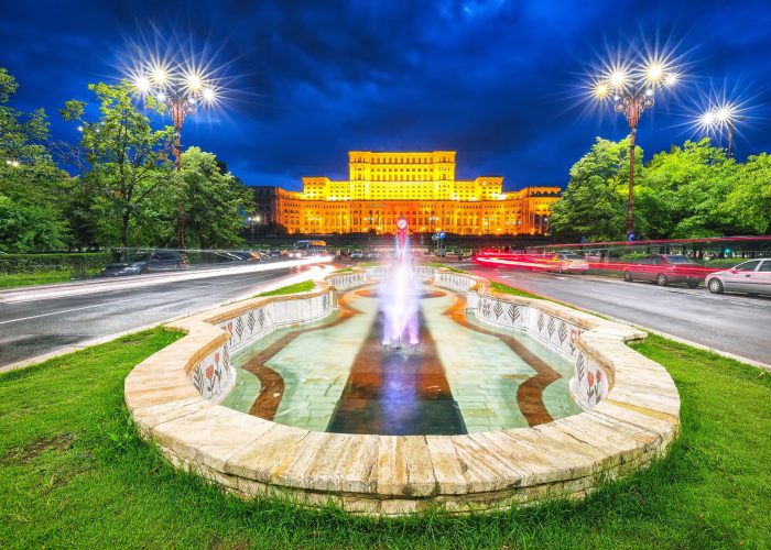 Illuminated Palace of the Parliament of  Bucharest at night. Dramatic evening view of Palace of the Parliament Bucharest city, Romania, Europe